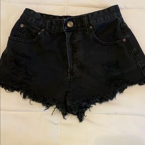 Black distressed bottom shorts